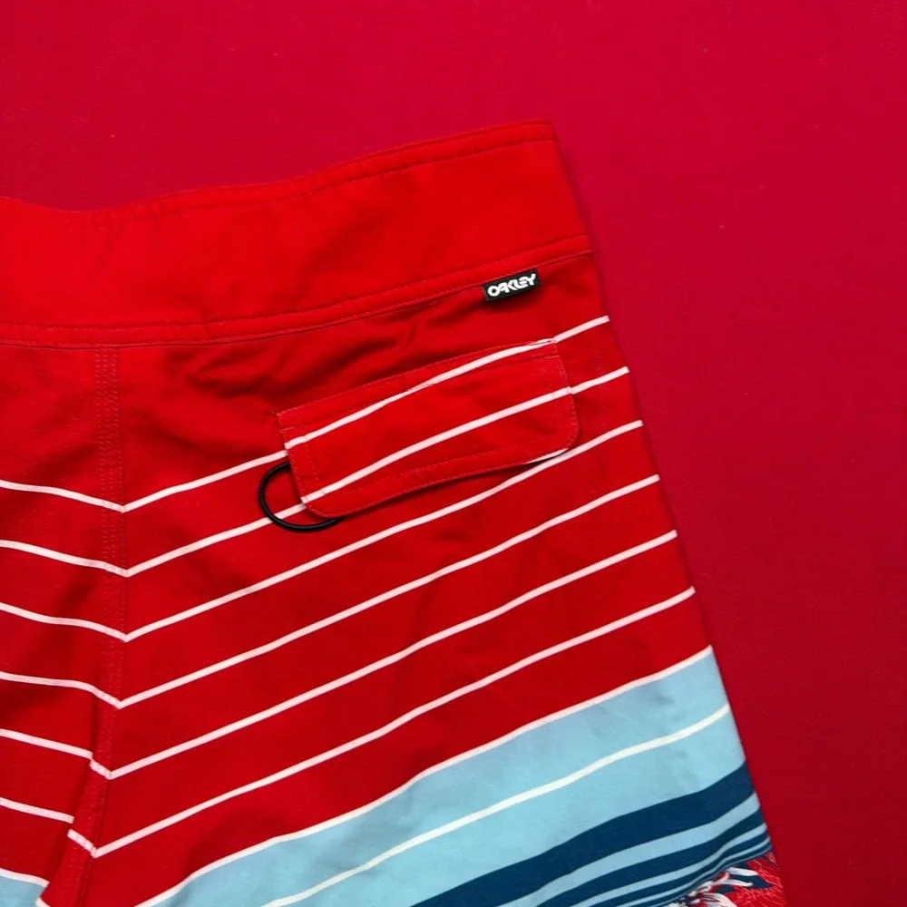 SURF Oakley Mens Board Shorts Red Striped Tropical Floral Swim Trunks Size 31